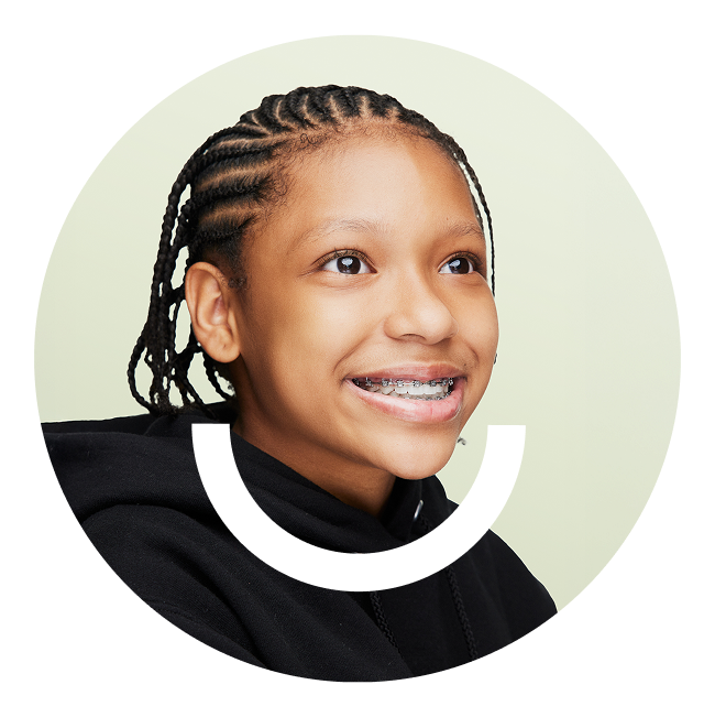 smiling child wearing braces