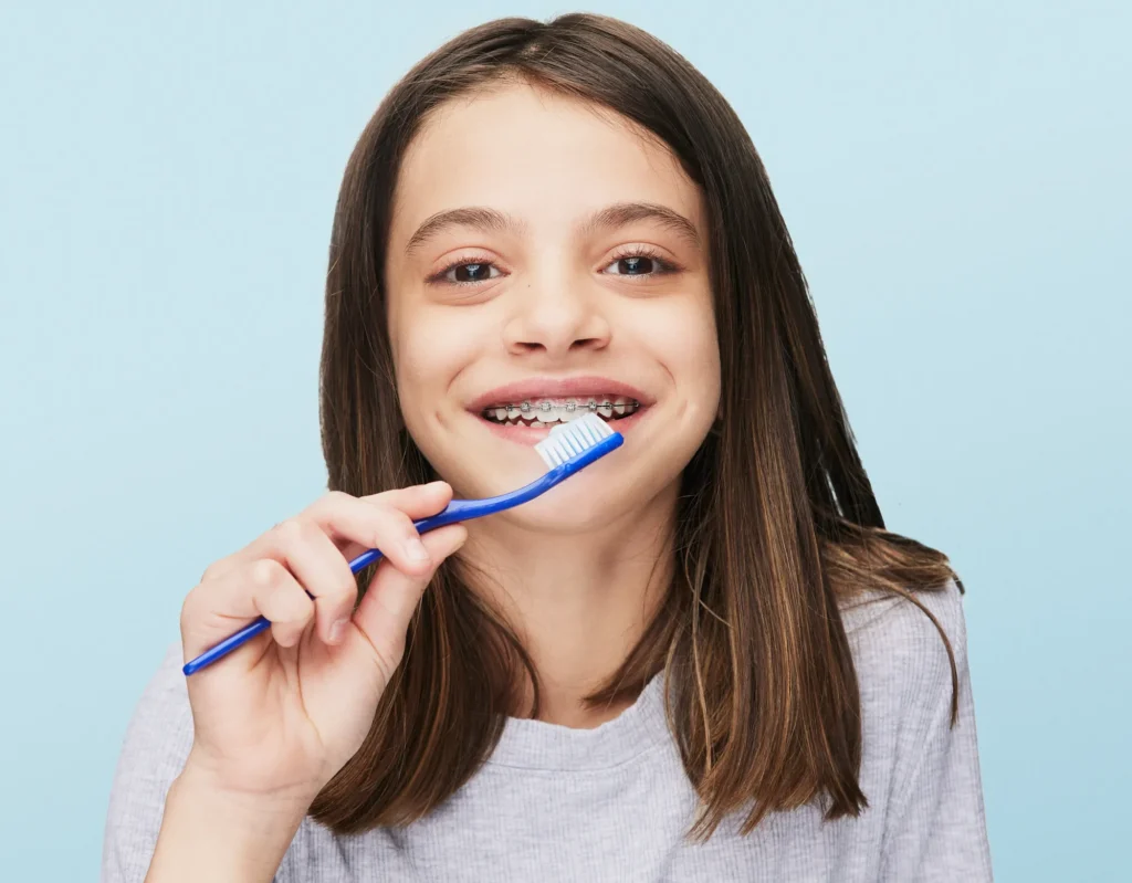 Teen smiling with braces
