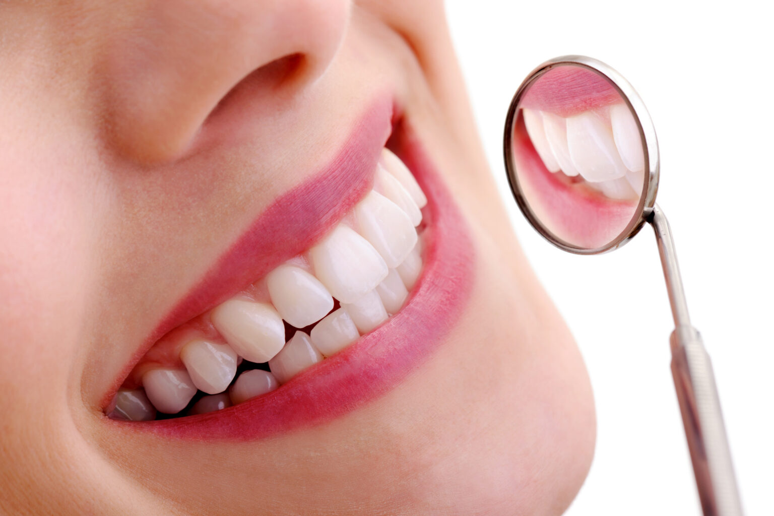 Close Up Of Smiling Woman Getting Teeth Examined