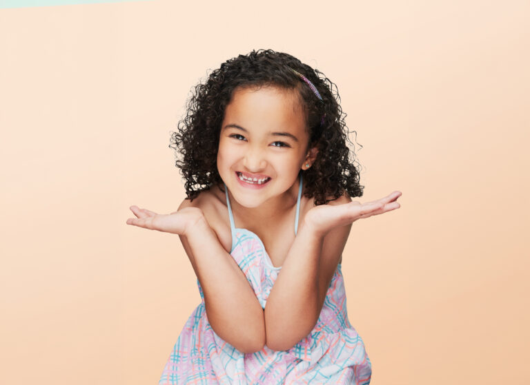 A Young Girl Making A Silly Fun Face